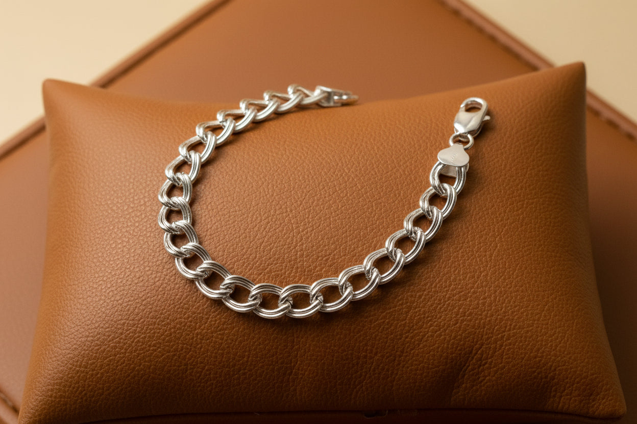 Sterling Silver 925 chain with a ruler for scale on a Carmel background