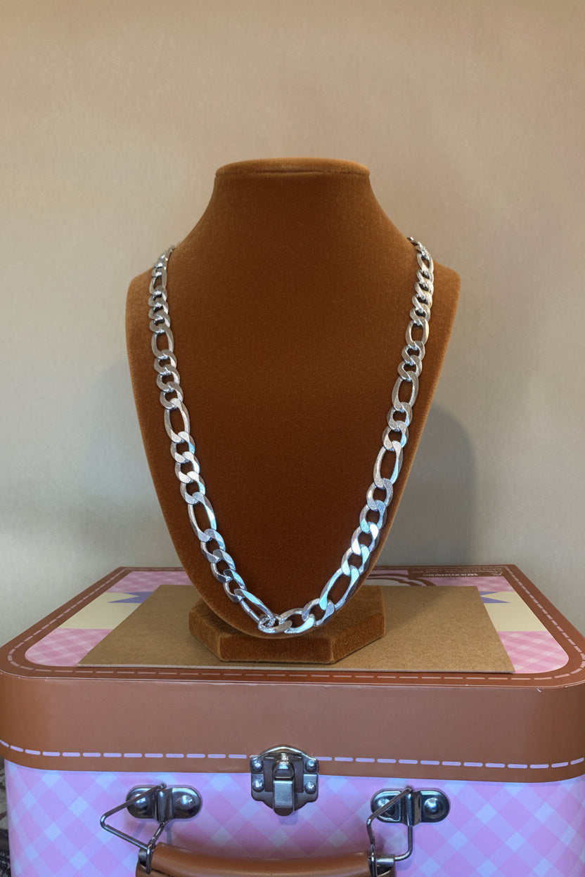 Sterling Silver chain 925 9mm 20 in on a carmen stand with a pink jewelry box in the background