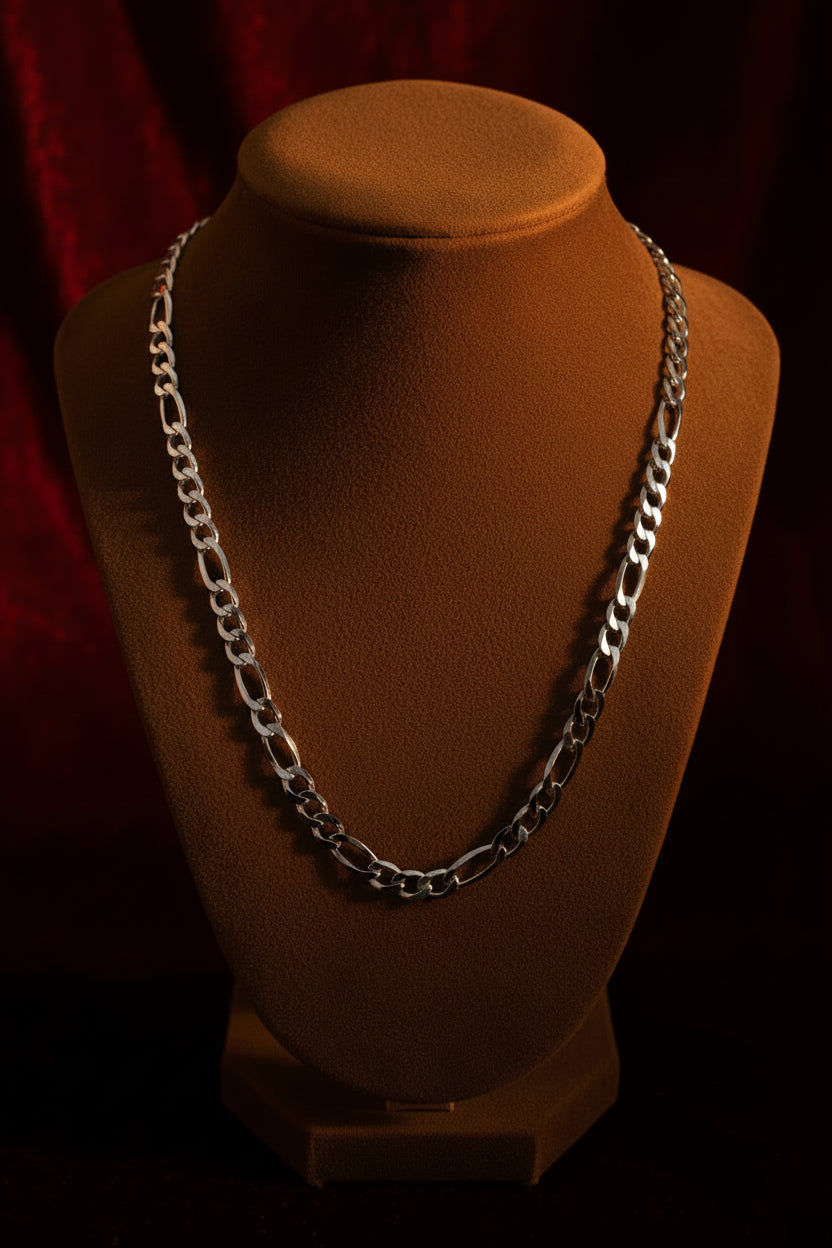 Silver Sterling chain on a red textured fabric background