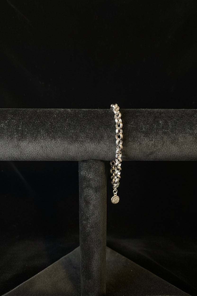 Sterling Silver Rolo Chain bracelet on a Black fabric background