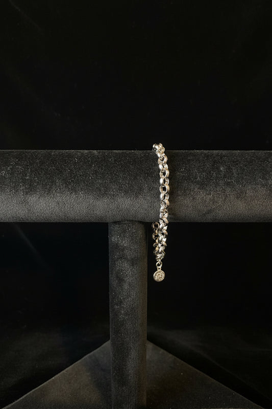 Sterling Silver Rolo Chain bracelet on a Black fabric background