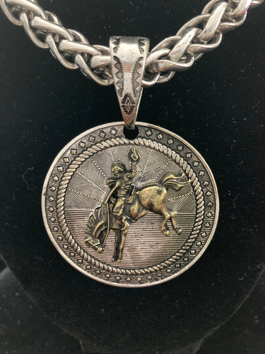 Silver-Plated necklace with a pendant featuring a Cowboy on horseback design.
