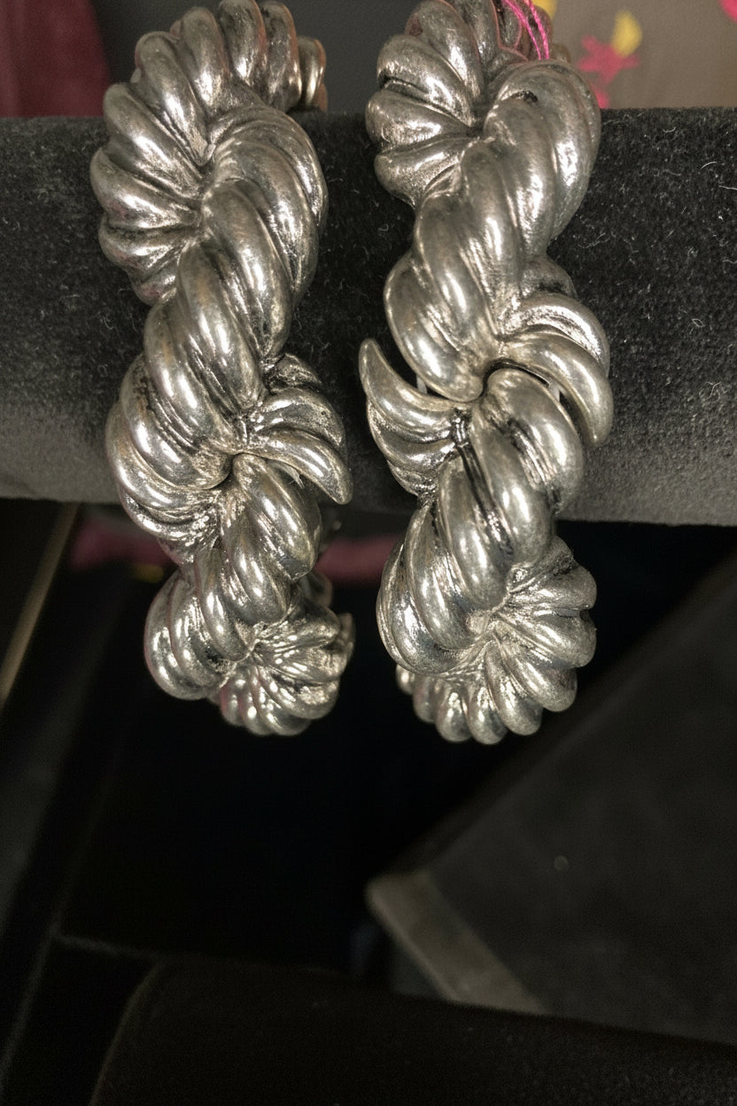 Silver-Plated Brangle Bracelet on Black Background