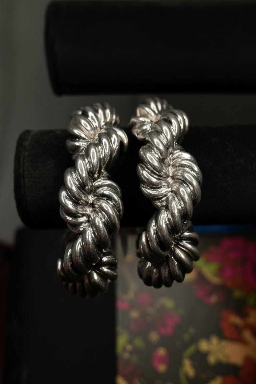 Chunky Rope like Silver - Plated Bracelet on Black Background