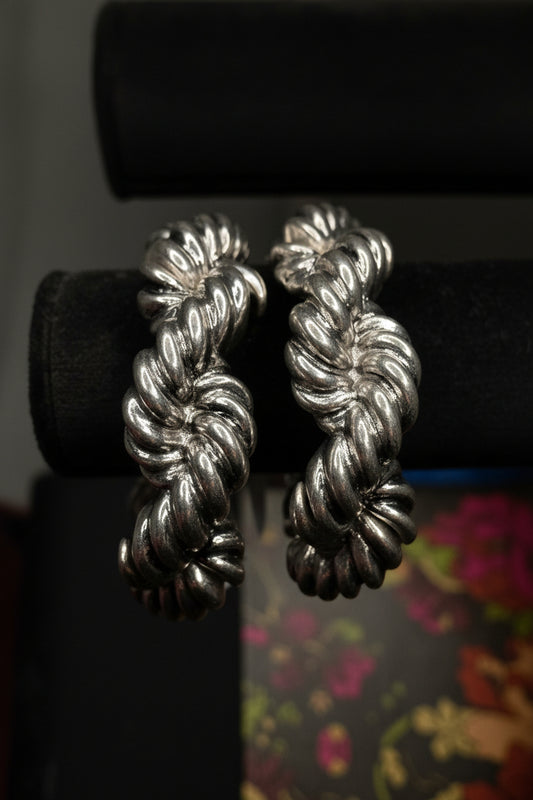 Chunky Rope like Silver - Plated Bracelet on Black Background