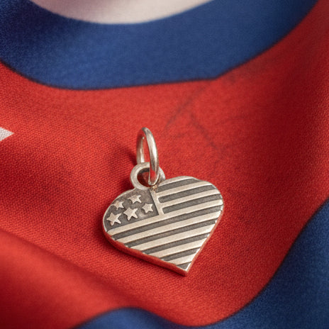 Silver heart-shaped American flag pendant 