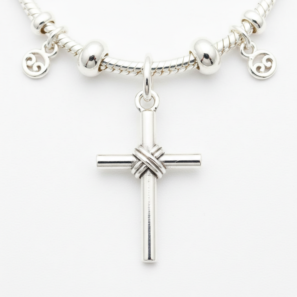 925 sterling silver cross wire tied charm on a bracelet